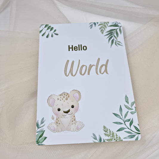 Baby milestone card with a baby leopard illustration and 'Hello World' text on a white background